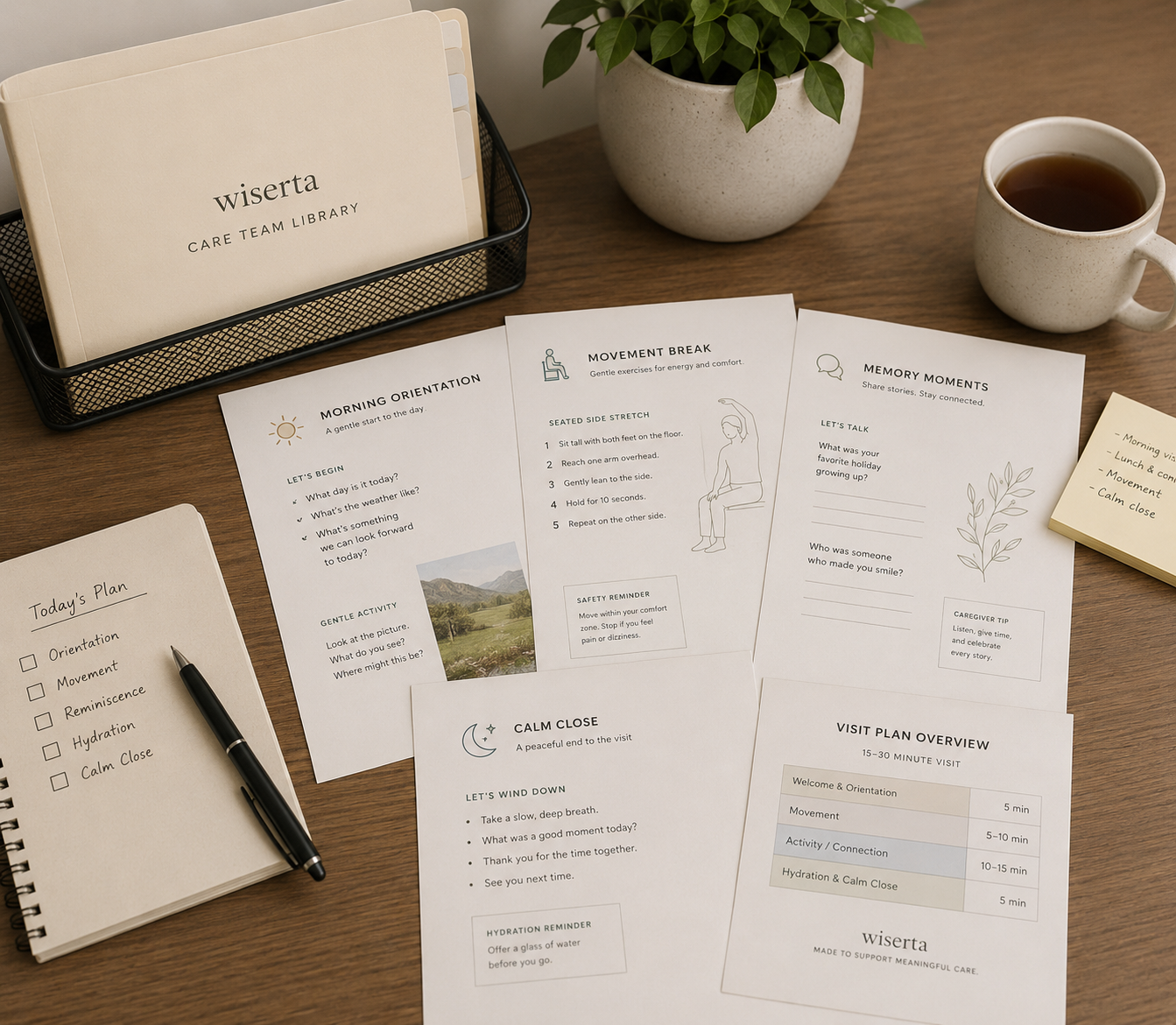 A Wiserta care-team library folder with printed activity pages laid out on a desk